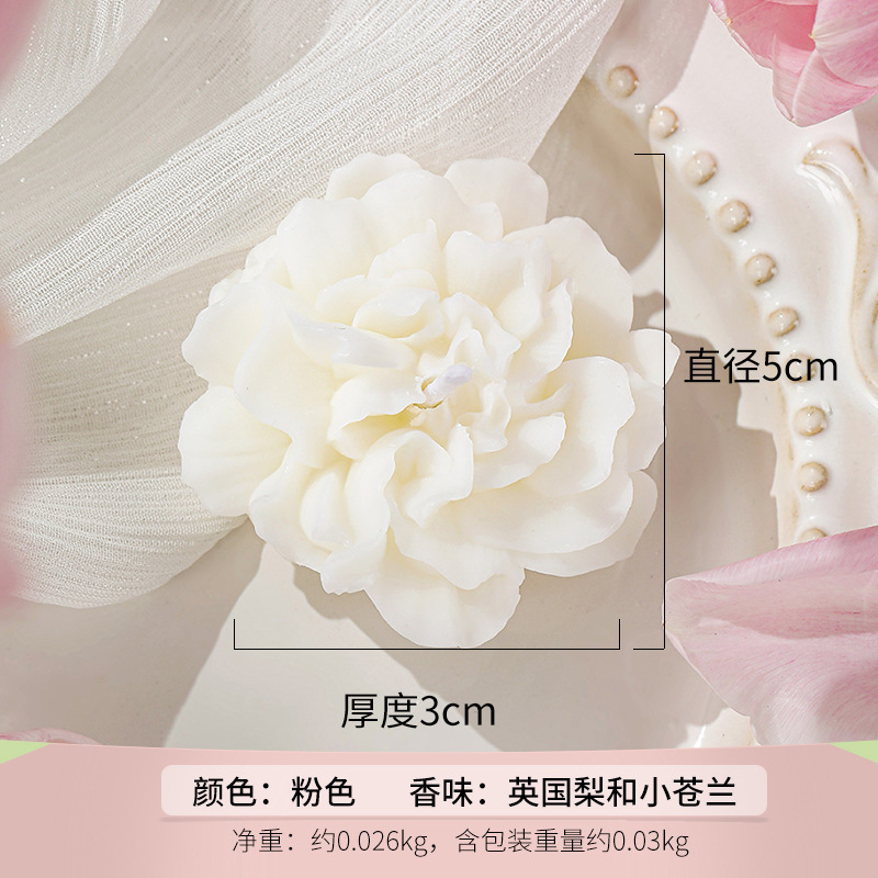 Bougie en forme d'œillet blanche (parfum : rose)
