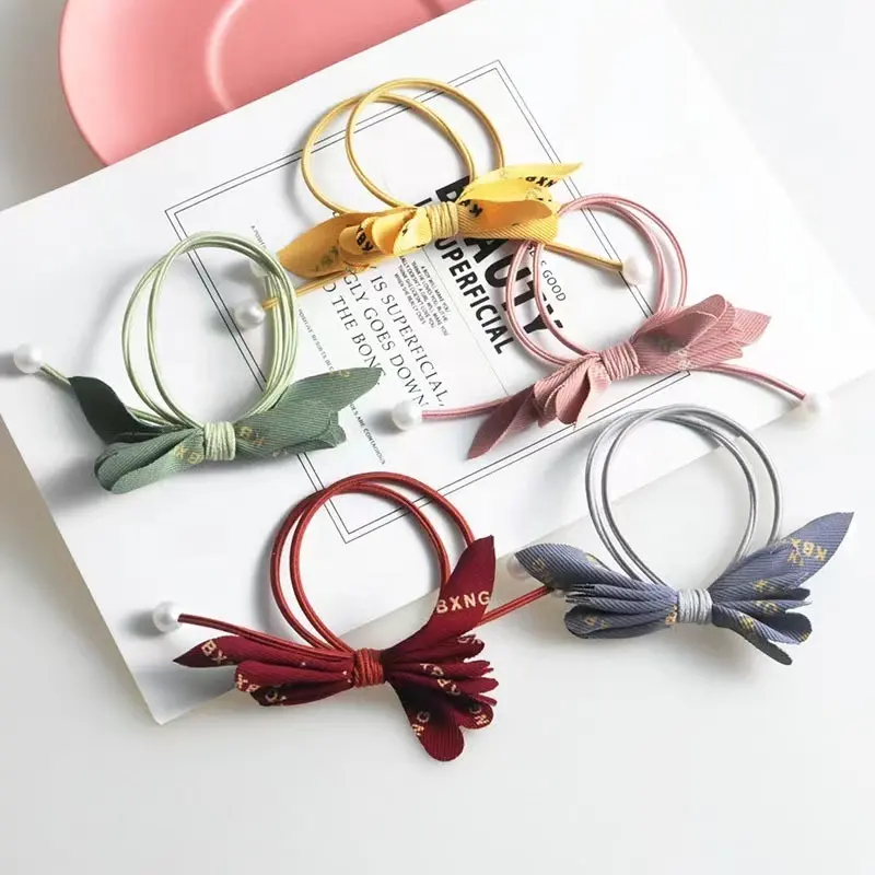 Factory Wholesale Girls Yellow Nylon Ponytail Faux Pearl Hair Tie Direct Supplier Hair Rope With Bow Tie
