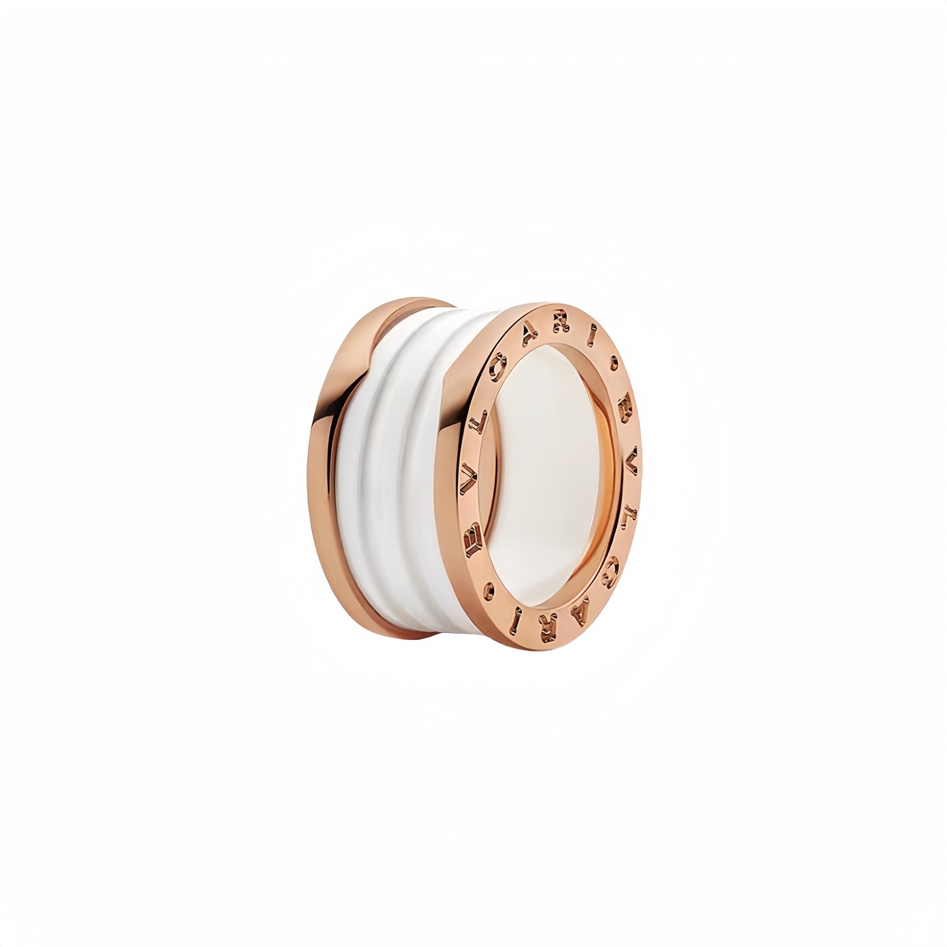 Cerámica blanca oro rosa de tres anillos.