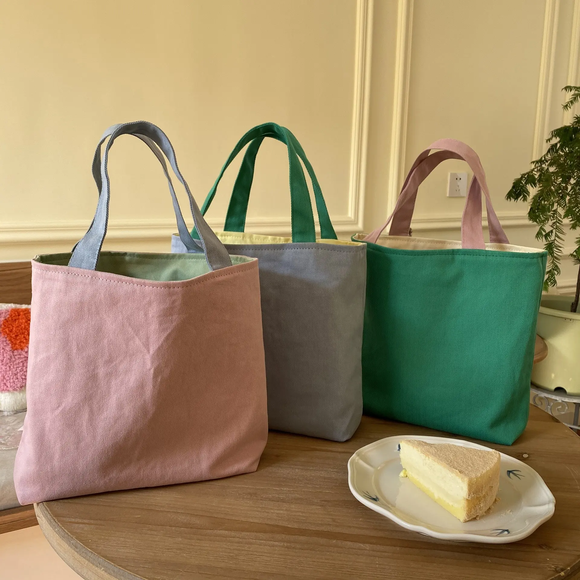 Bolso de compras plegable de combinación de colores simple de doble cara de doble uso Bolso de lona multiusos para mujer