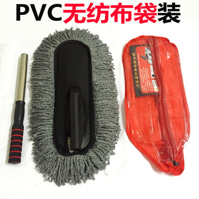 Grandes pantoufles cirées grises dans un sac en PVC