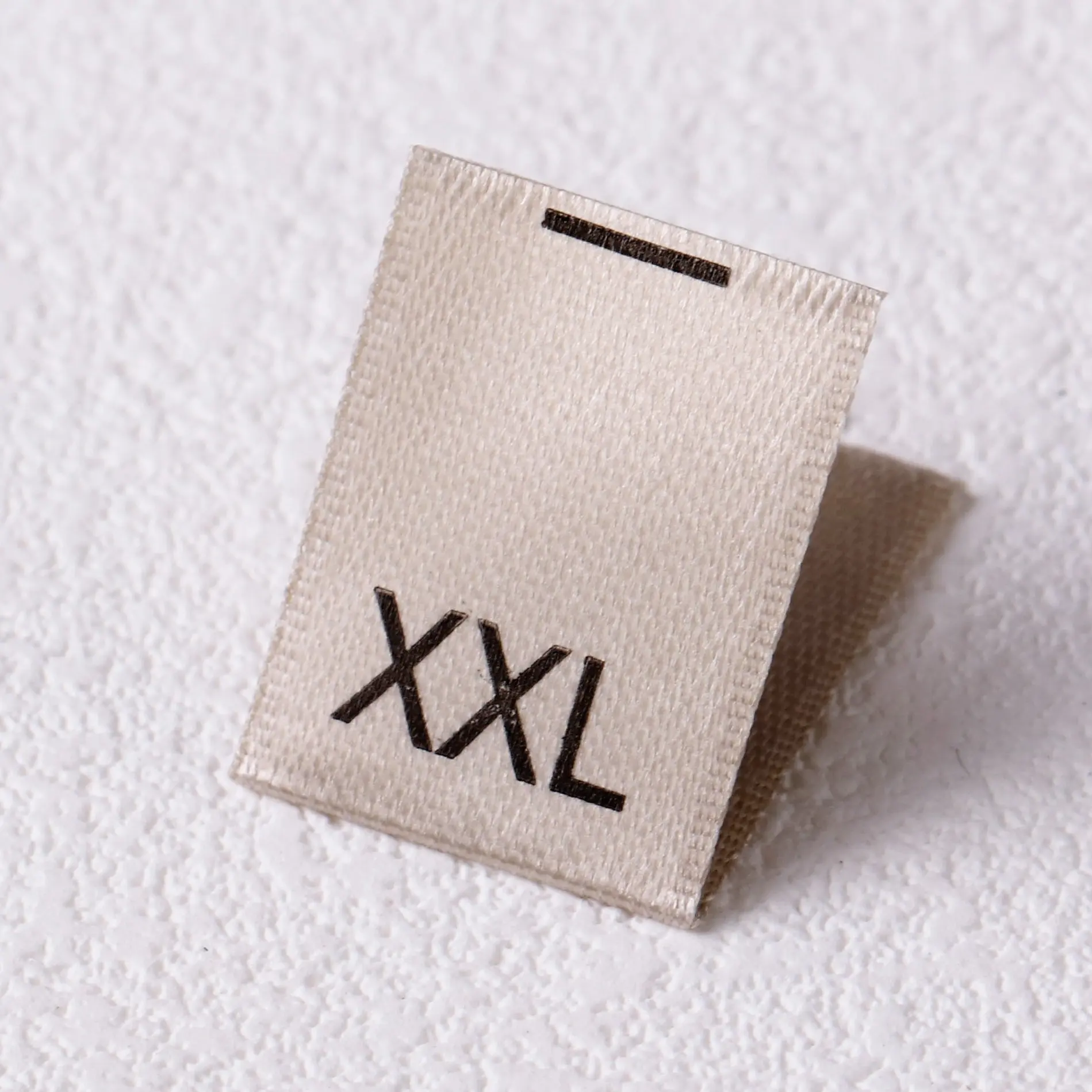 ผ้า XS-XXL สีขาวแบบม้วนป้ายขนาดเสื้อผ้าป้ายแบบซักได้ป้ายแบบซักได้