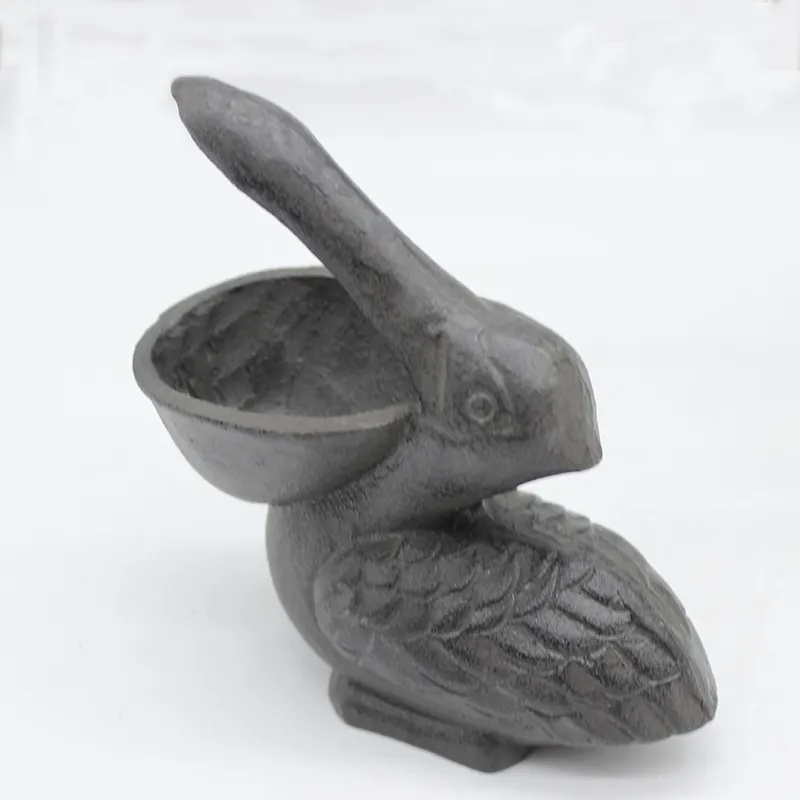 Vintage metal pelican cast iron animal hide a key safe holder rustic garden ornament