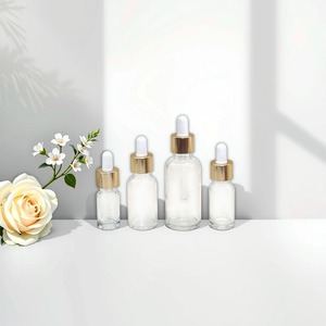 Para Venda Clear Flat 5ml <span class=keywords><strong>10ml</strong></span> 15ml 20ml 30ml 50ml 100ml Vazio Redondo Cilindro Garrafa Conta-gotas De Vidro Garrafa De Óleo Essencial