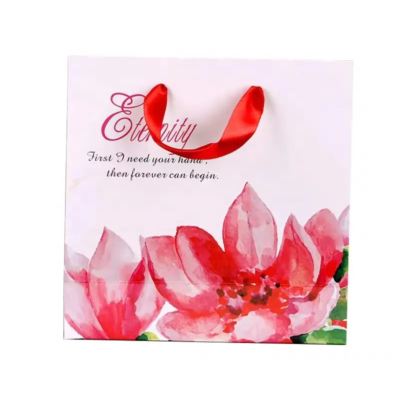 Bolsa de papel de lujo con impresión personalizada para el cuidado de la piel, bolsa de bienvenida, bolsa de compras con asa de cinta de Perfume personalizada con logotipo