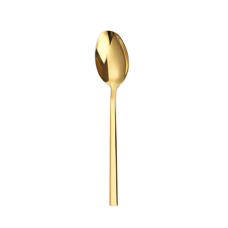Cuchara de mesa dorada