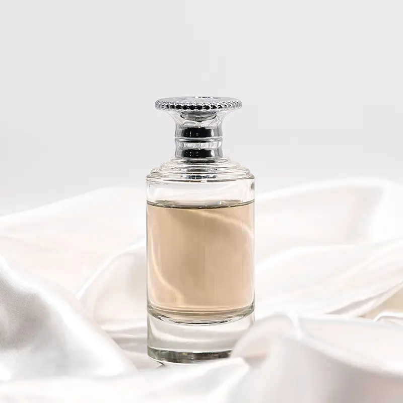 Nouveau style bouteille de parfum cylindre en verre 70ml bouteilles de parfum à bas prix en verre en vrac pour emballage cosmétique