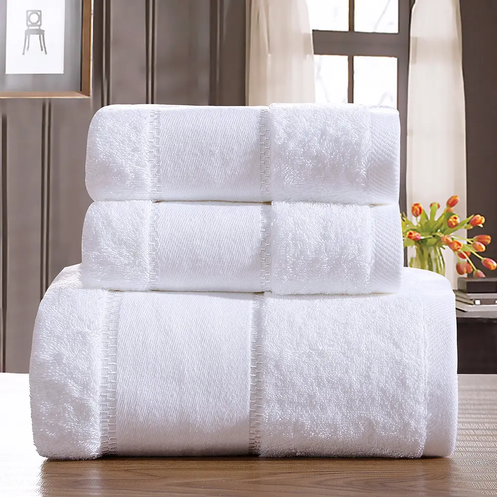 Asciugamano da bagno per Hotel a mano di lusso in tinta unita bianco 100% cotone 500gsm 600gsm