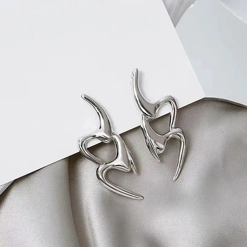 Stainless steel Potential series Sharp Note earrings Hipster design earrings Women fashion niche temperament High sense earrings