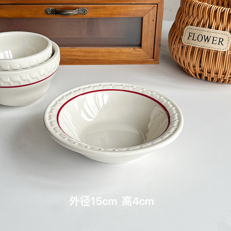 A 6-inch straw hat bowl with red line relief