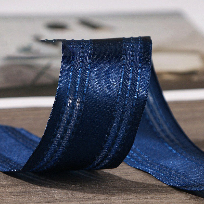 Bleu marine-2,5 cm, 50 ans par rouleau