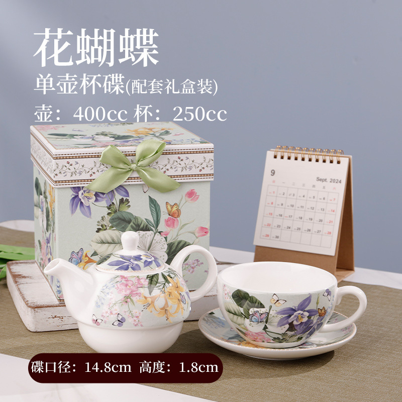 Teapot with cup and saucer set