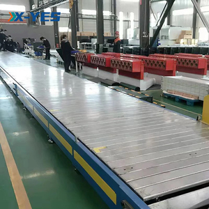 Solución de logística inteligente X-YES para lograr una situación beneficiosa para todos. Transportador de cadena de placas Sist