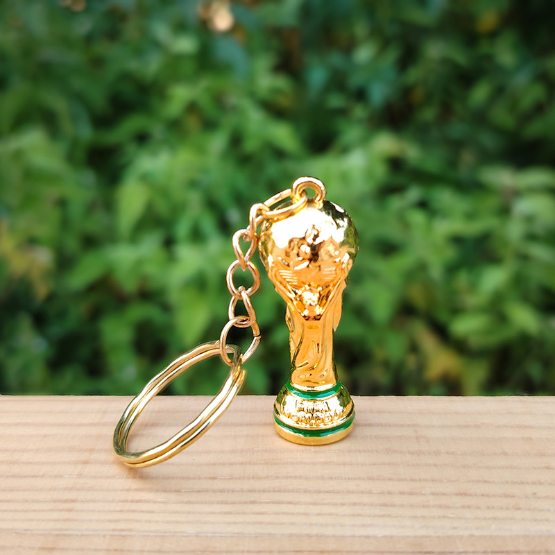 Llavero dorado de la Copa del Mundo