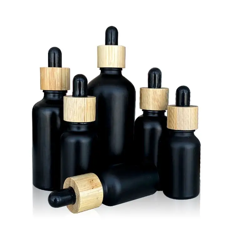 Approvisionnement en stock prix usine verre mat 10 ml bouteille noire huile essentielle pour sérum de soin de la peau pour hommes emballage d'essence d'ours de cheveux