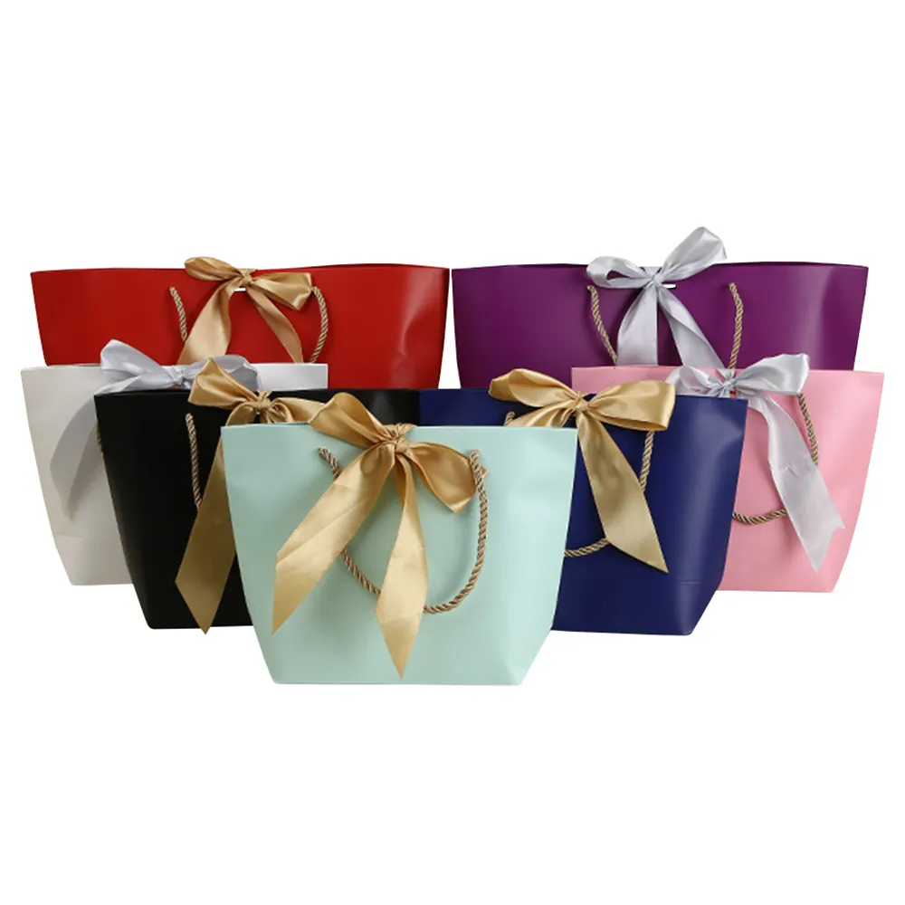 Bolsa de papel personalizada con mango bonito, con logotipo, tarjeta de papel, monedero, compras, trapezoidal, embalaje único, cinta de regalo