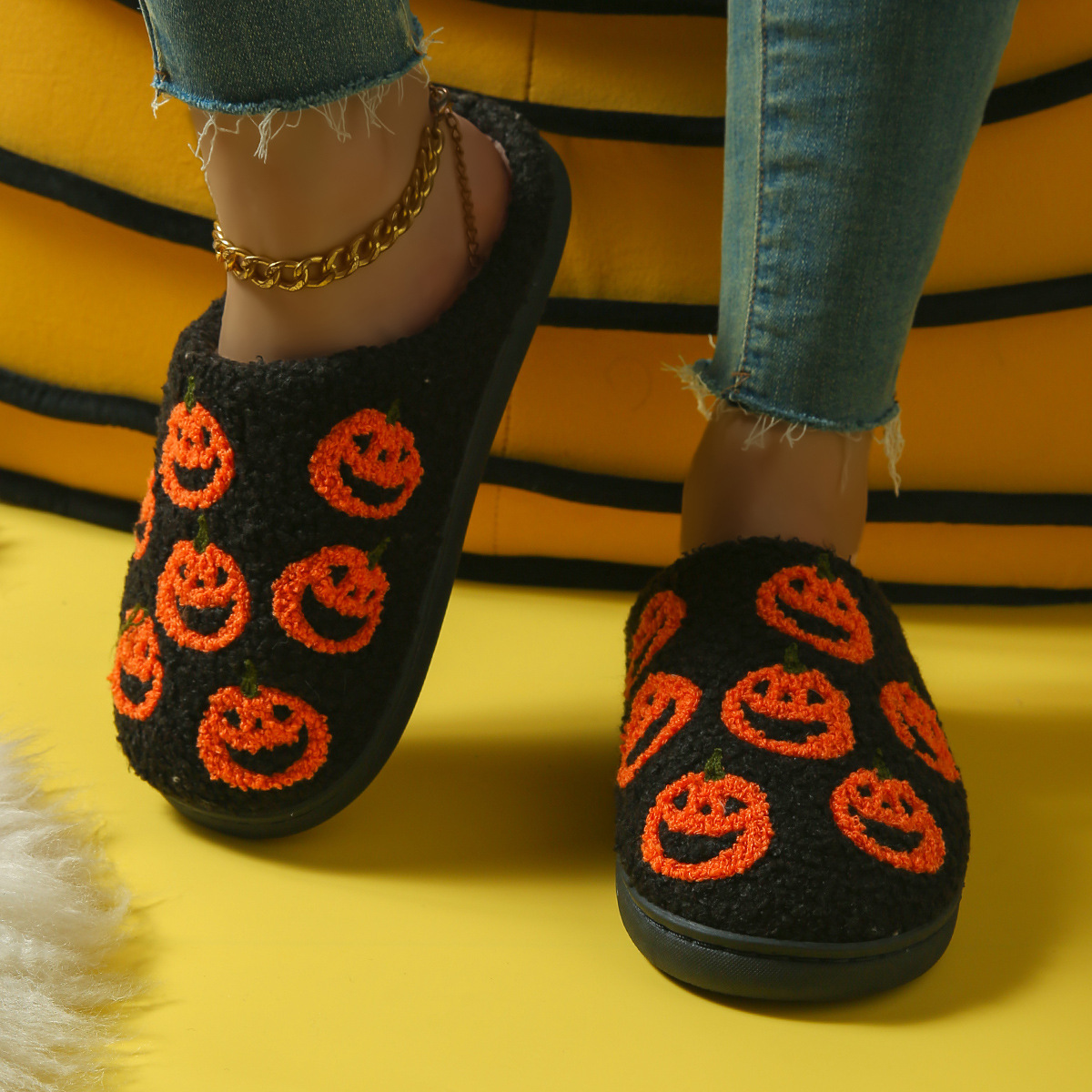 Multiple small black pumpkins