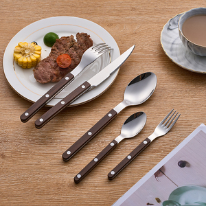 Wieder verwendbares klassisches Edelstahl-Steak messer Kunststoff-Niet griff Besteck Holz muster Besteckset