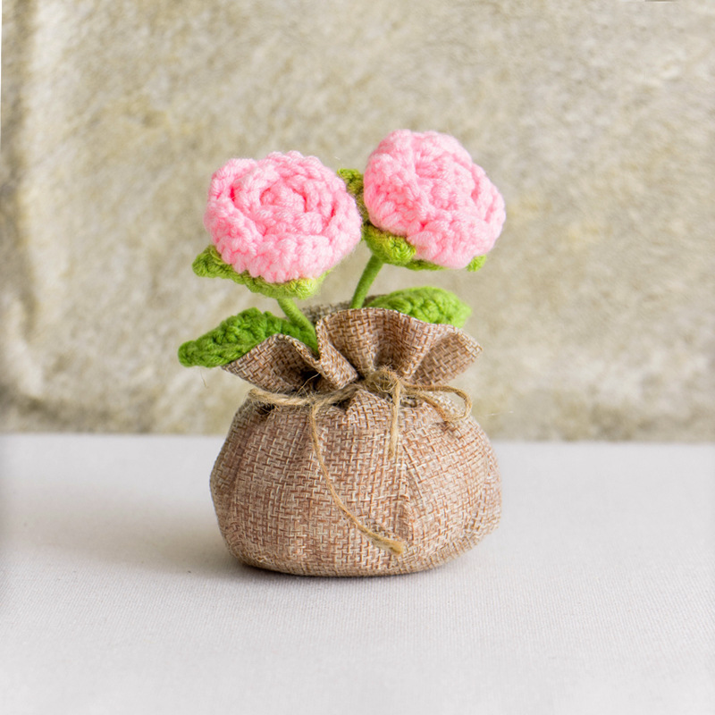 Bolsa de la suerte con rosas rosadas de doble punta.