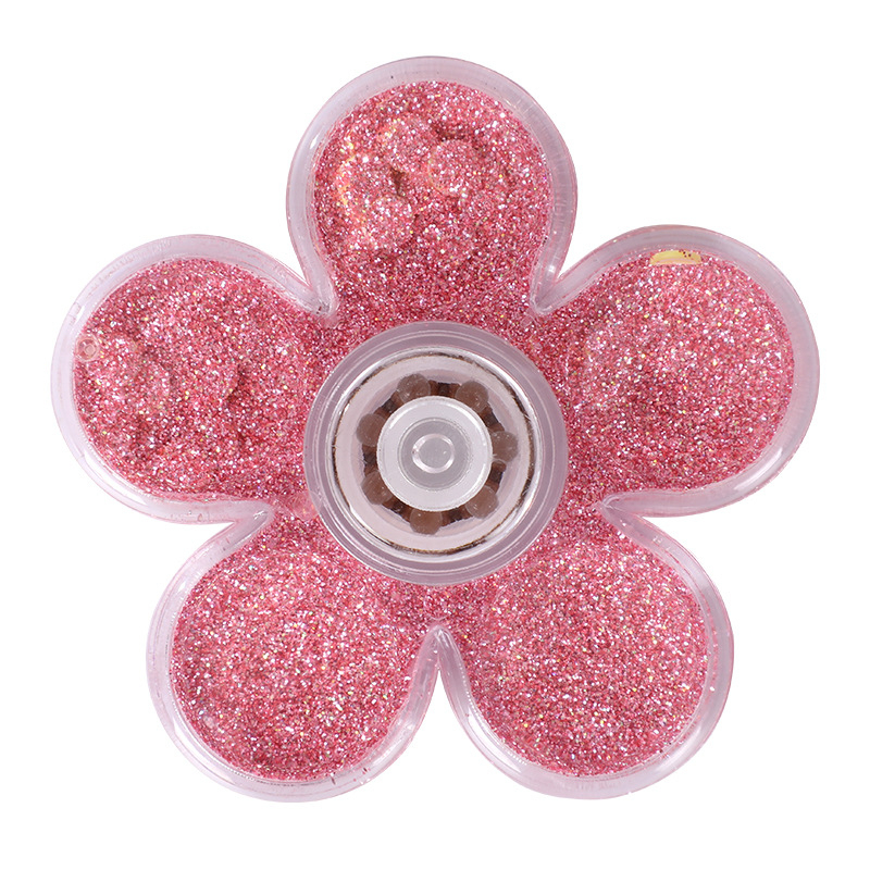 Toupie de sable aux fruits roses