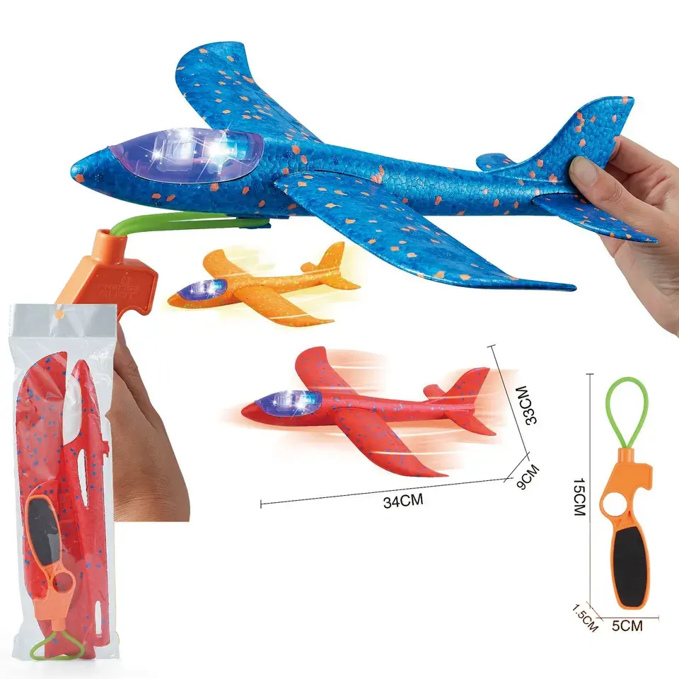 Giochi all'aperto Shooter Launcher Hand Throw Flip ruota Glide catapulta Slingshot Mode Foam Glider Flying Plane Toy con luce