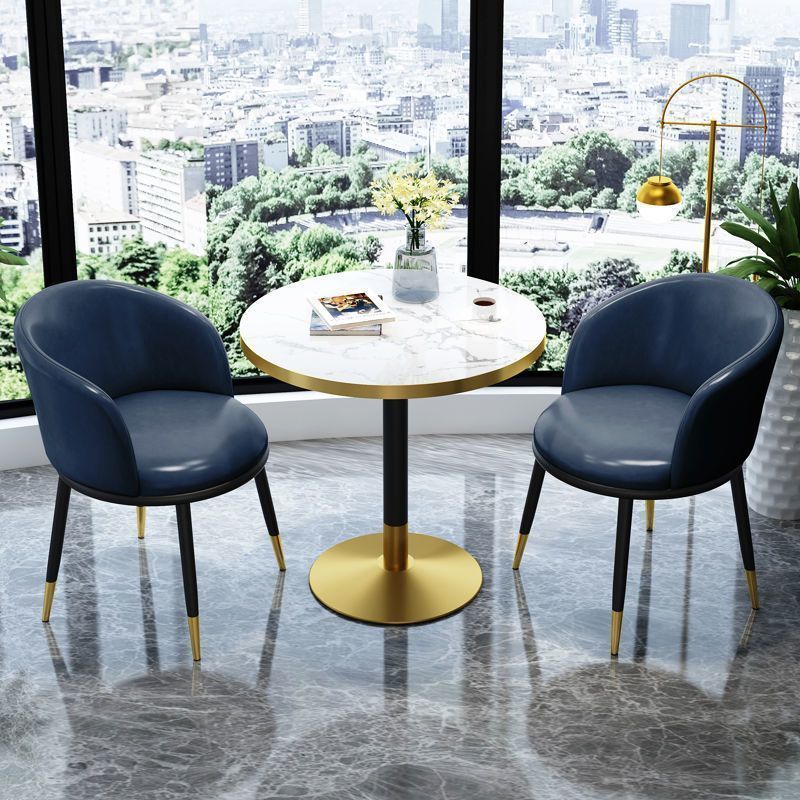 Dark blue leather chair imitation stone round table