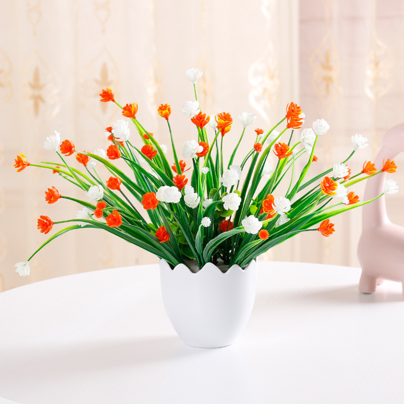 Aliento de bebé, flor de Milán, naranja y blanco