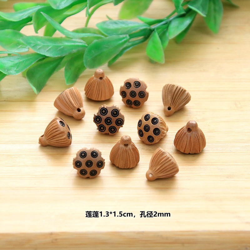 Peach wood lotus seedpod pendant