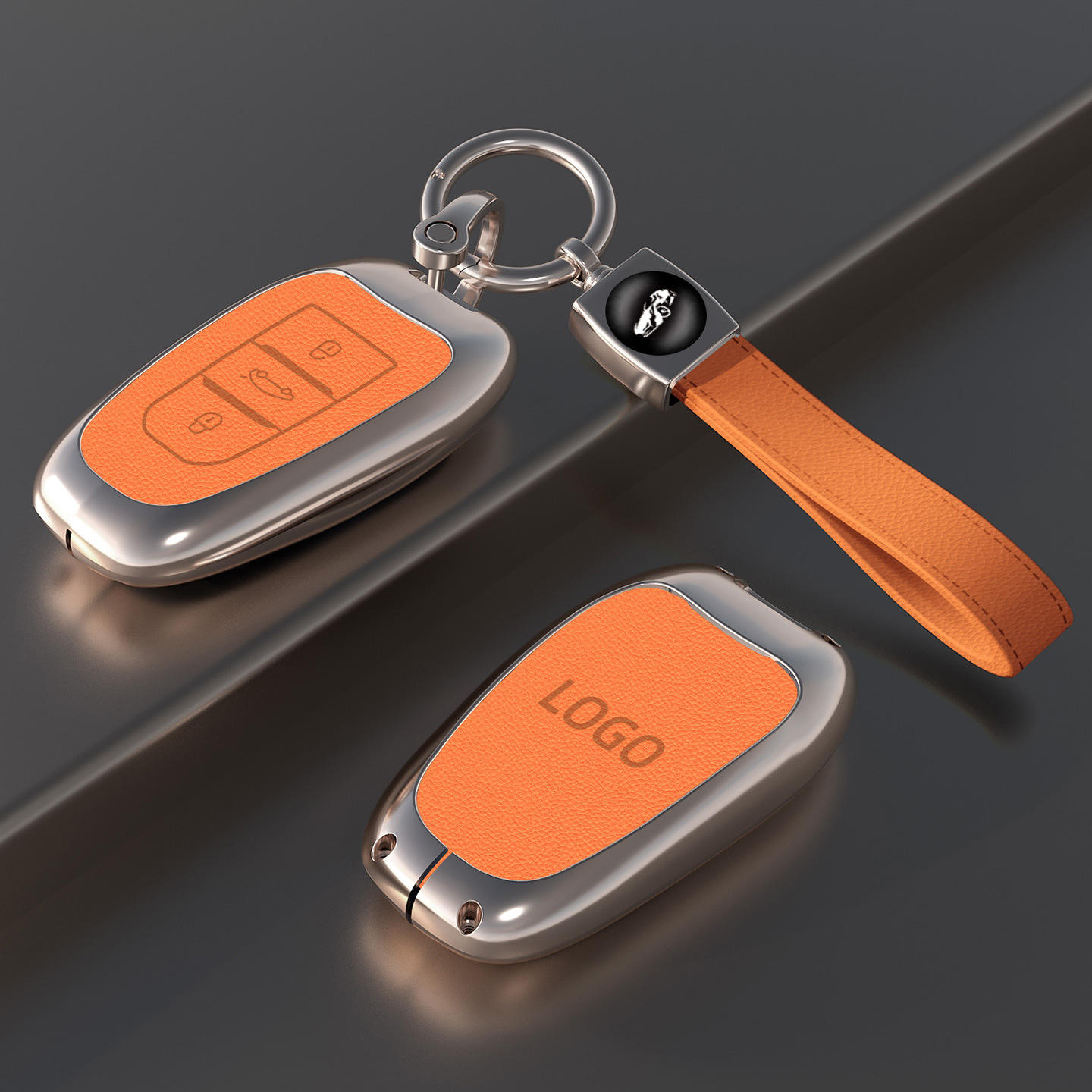 Cache-clé orange avec dragonne