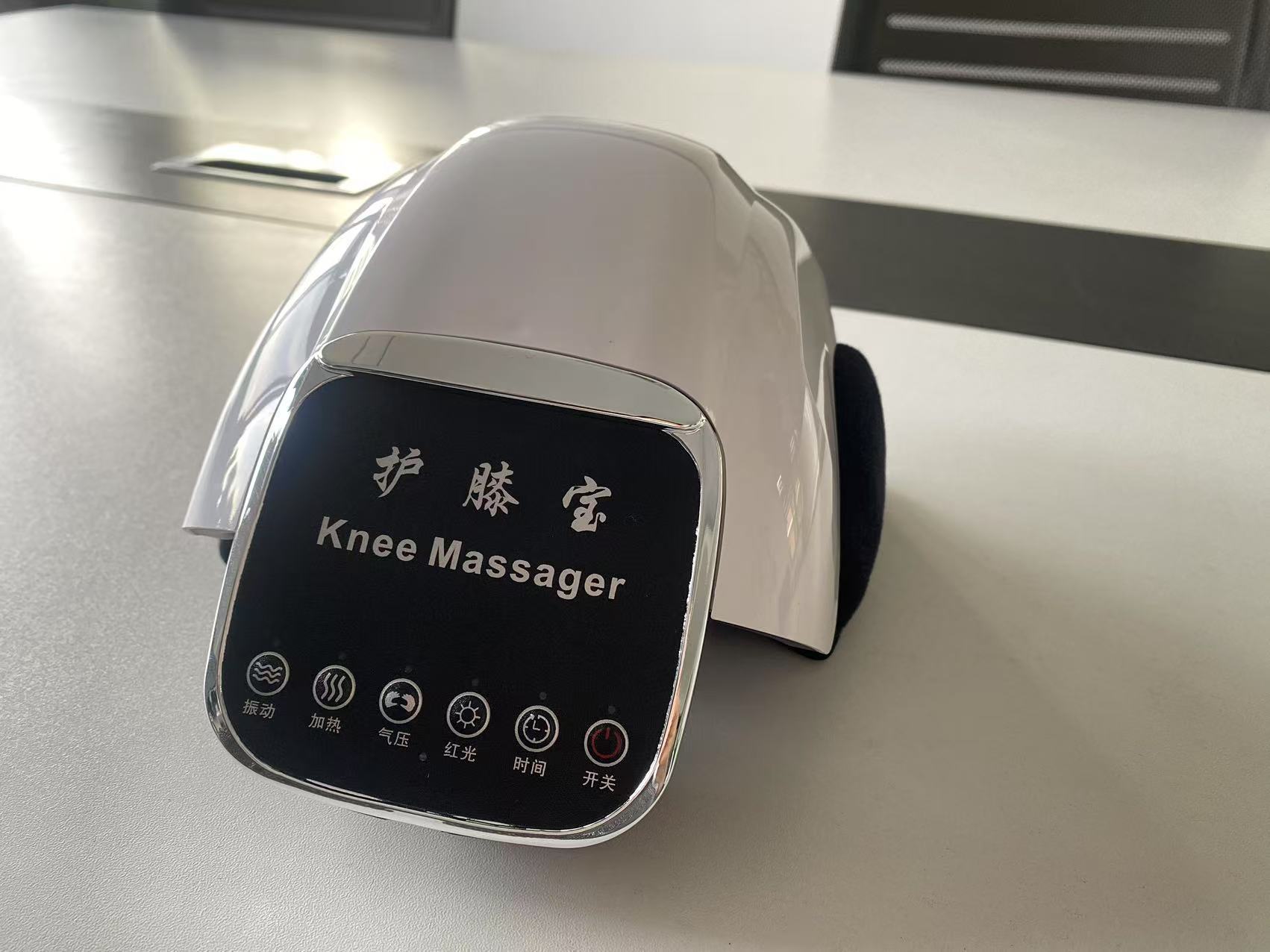 Button chinese style knee massager