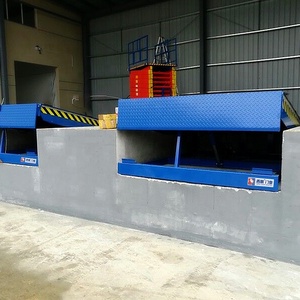 China Warehouse Cargo <strong>Loading</strong> <strong>Unloading</strong> Dock Leveler Adjustable Plate Work <strong>Platforms</strong> Hydraulic <strong>for</strong> Truck Mechanical Dock Levele