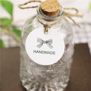 Recyclable Luxury Embossed Paper Hang <strong>Tags</strong> Uv <strong>Printing</strong> Hang <strong>Tag</strong> Swing <strong>Tag</strong> With <strong>String</strong> Rope for Clothing - Product Image 2