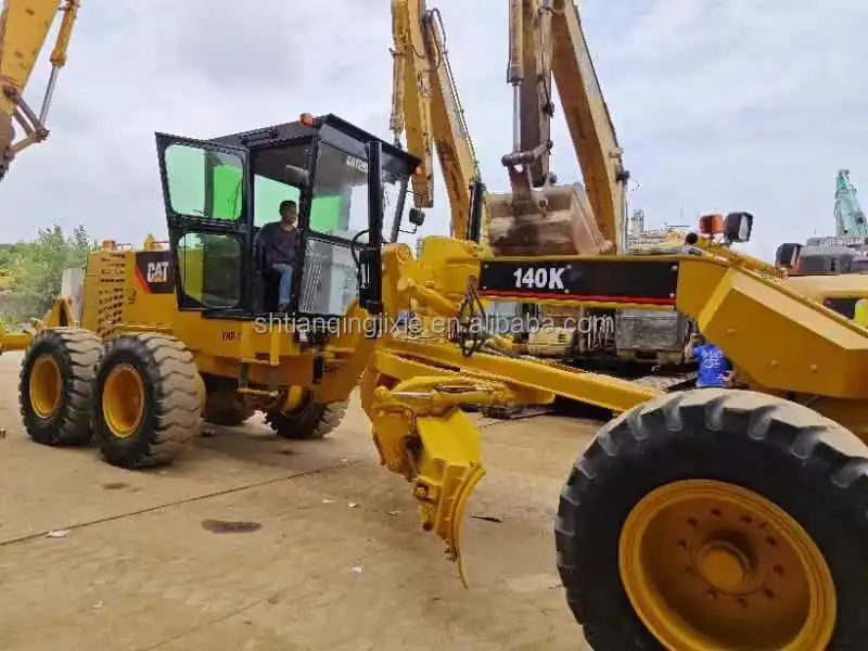 Motoniveladora CAT140K usada con desgarrador Caterpillar escarificador maquinaria de construcción de estadios precio bajo se vende bien en Sudáfrica