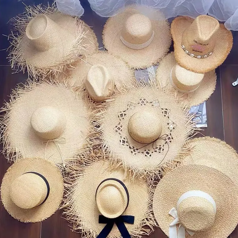 Vente en gros de chapeau de paille Lafite raphia d'été avec logo personnalisé chapeau de plage à large bord pour femmes chapeaux fedora Panama pour vacances à la mer