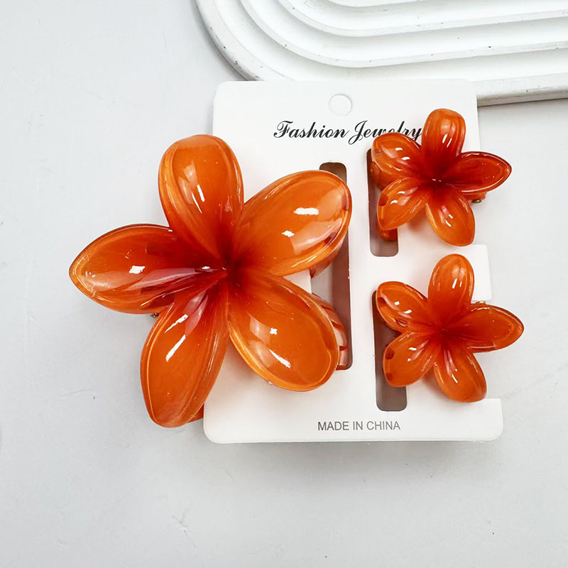 Carte de jeu orange foncé incluse.