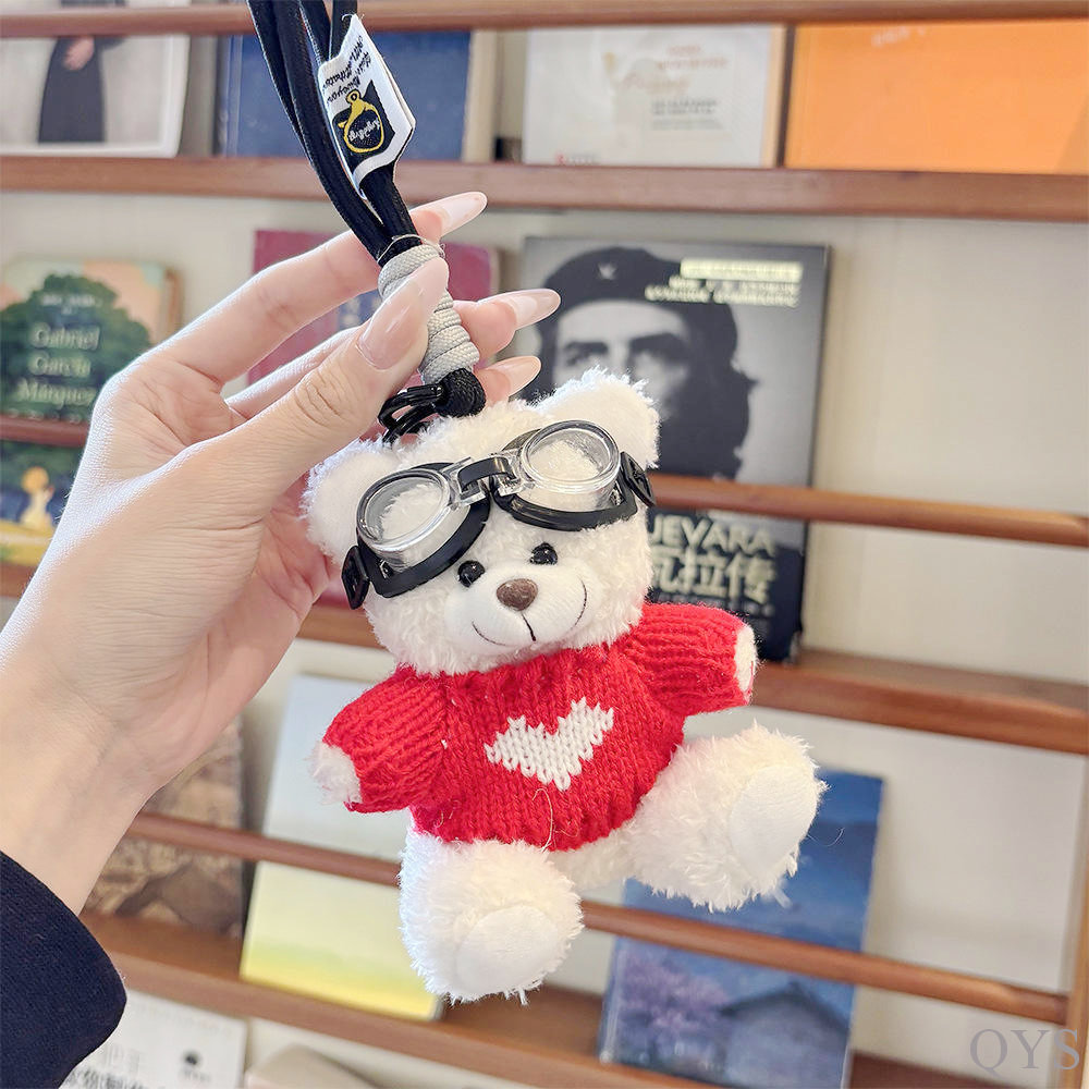 White bear red sweater lanyard glasses