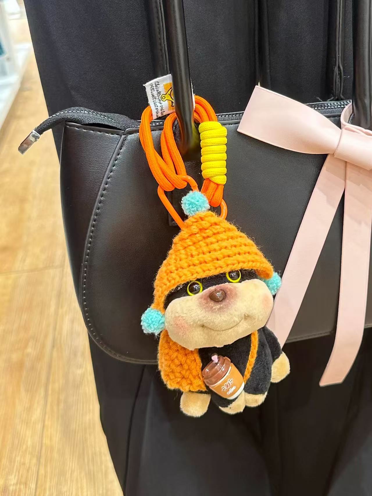 Orange headgear satchel-hand strap