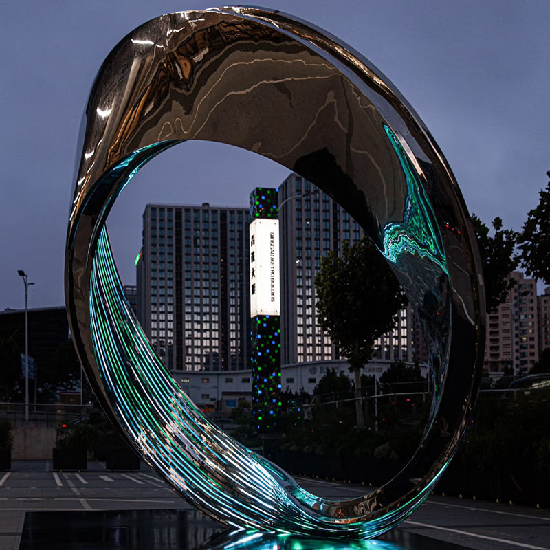 Bague lumineuse argentée - Sculpture en acier inoxydable
