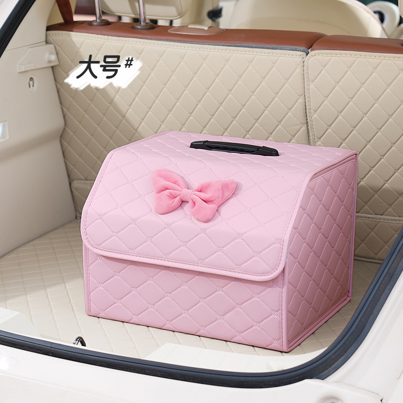 Large folding storage box with pink velvet bow