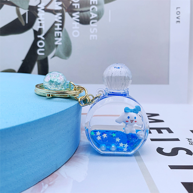 Botella de perfume para perros con diseño de canela y jade azul brillante.