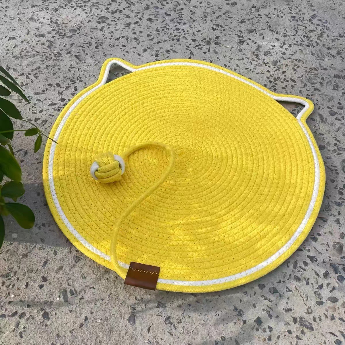 Yellow toy ball integrated mat