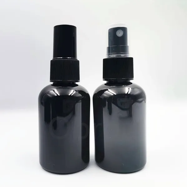 Gran oferta botella de aceite esencial redonda con champú para el cabello cabeza de bomba más fresca negro 60ml 2oz botella de spray de plástico