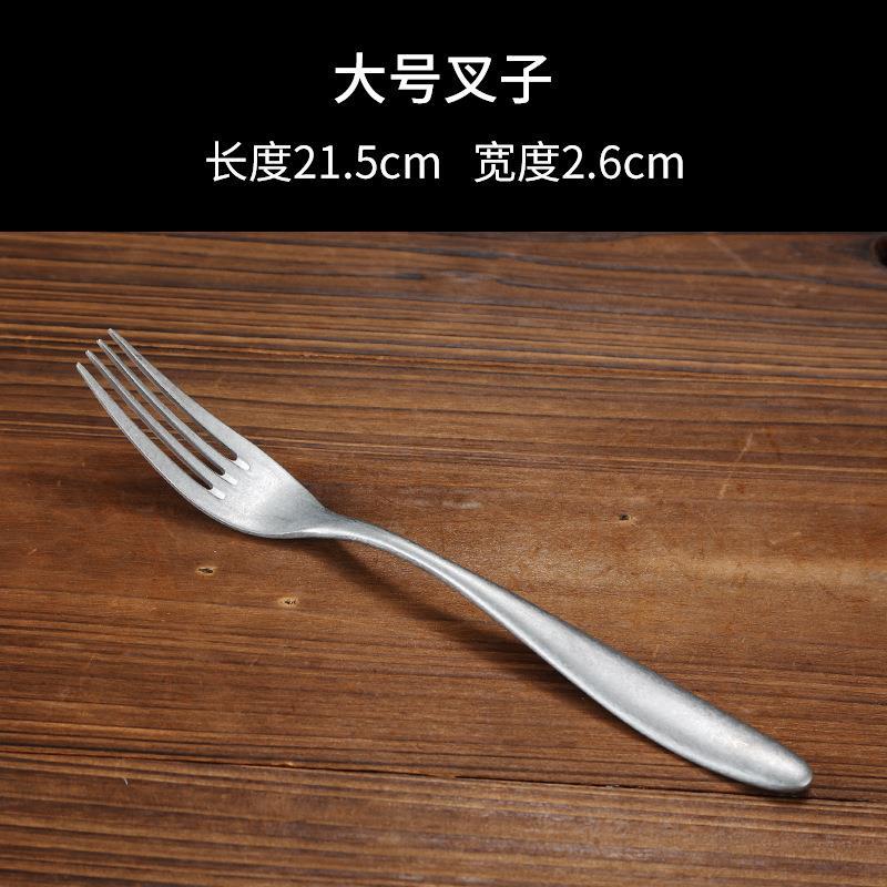 Rounded handle main dinner fork (snowflake pattern)