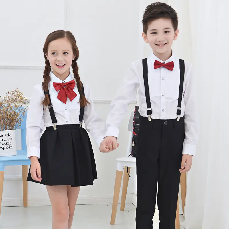 Nuovo Set uniforme scolastica in cotone con bretelle e camicia in cotone