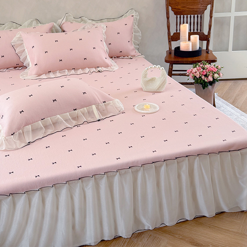 Tapis jupe de lit - noeud rose éthéré