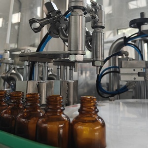 <strong>Automatic</strong> <strong>Rotary</strong> 30ml 60ml Essential Oil Bottle Filling <strong>Machine</strong> Filling <strong>Capping</strong> <strong>Machine</strong> Production Line