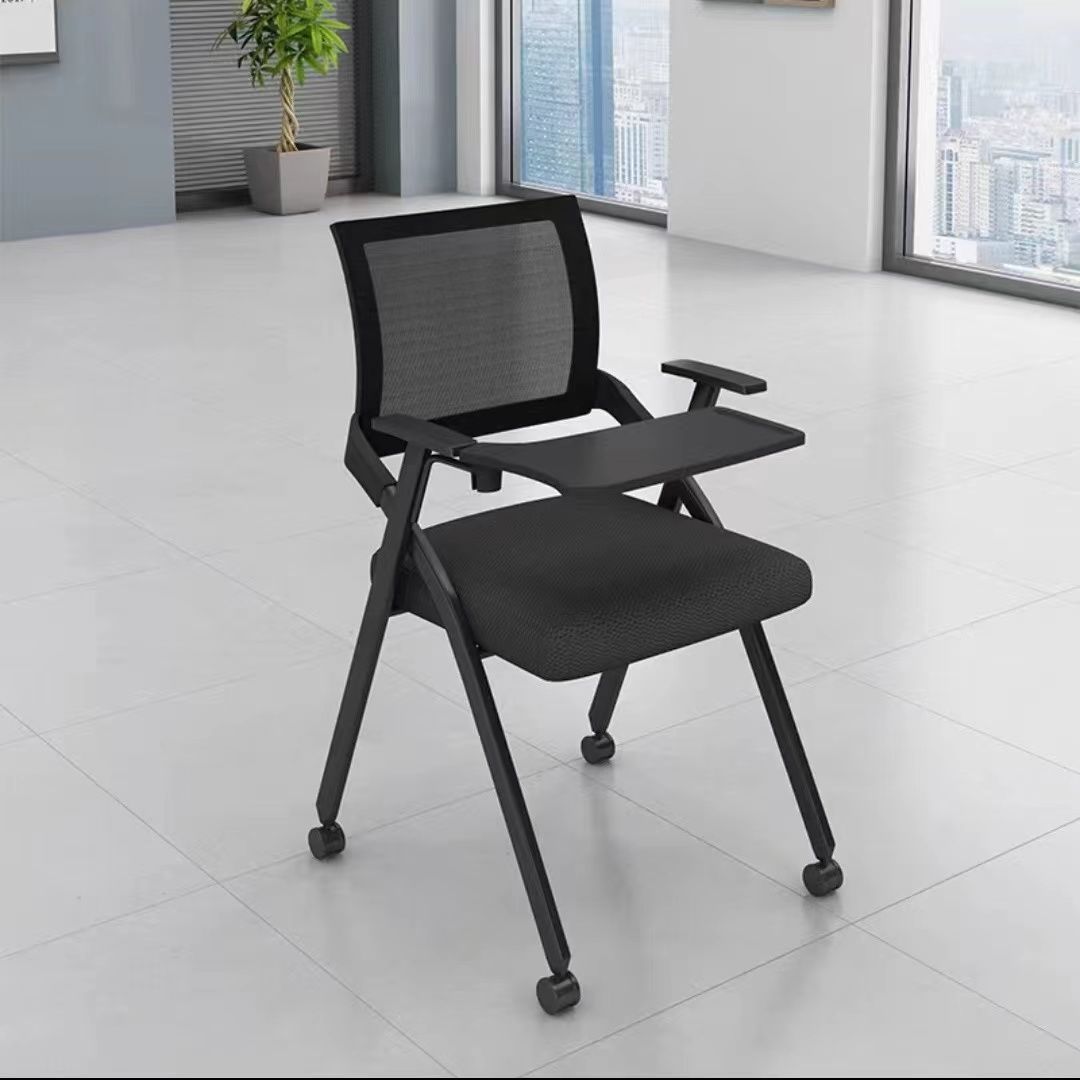 Respaldo negro con mesa y ruedas.