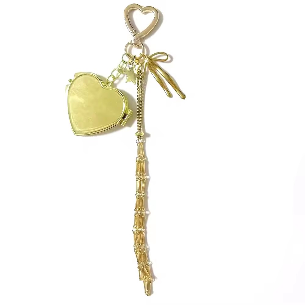 Gold alloy net with heart mirror