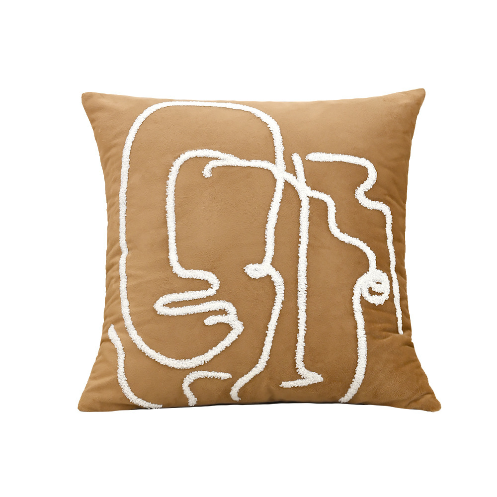 Broderie visage marron