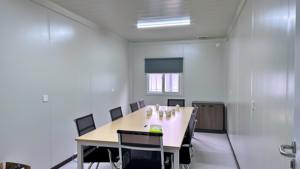 Casa contenedor modular Panel sándwich de lana de roca prepintado Tipo contenedor expandible de acero de embalaje plano Edificio de oficinas